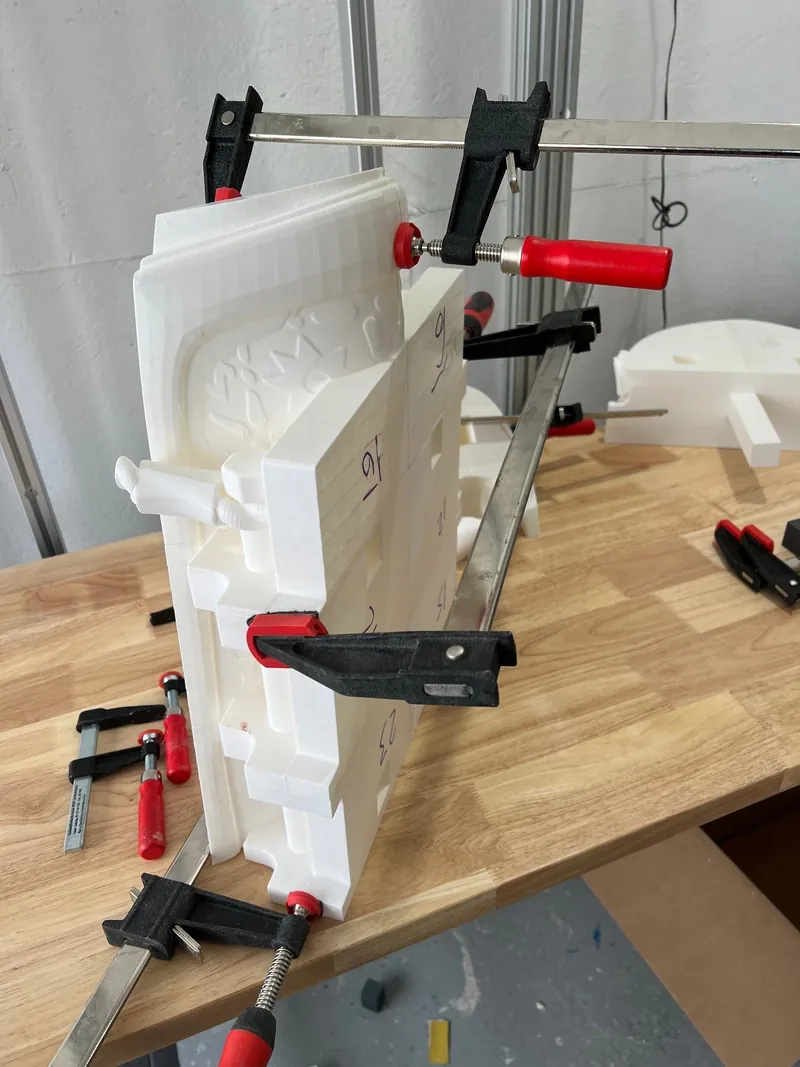 Age of Empires war elephant parts clamped while the glue sets